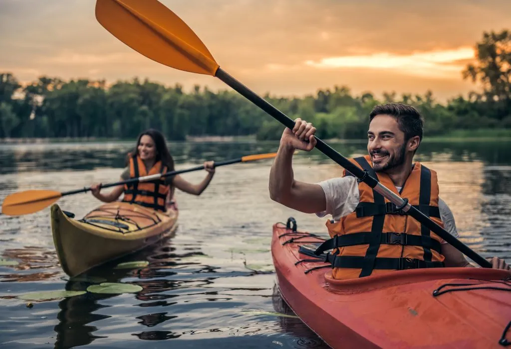 Couple travelling by kayak