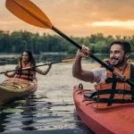 Couple travelling by kayak